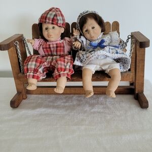 Craft Dolls on Wooden Swing with Blue and White Outfits